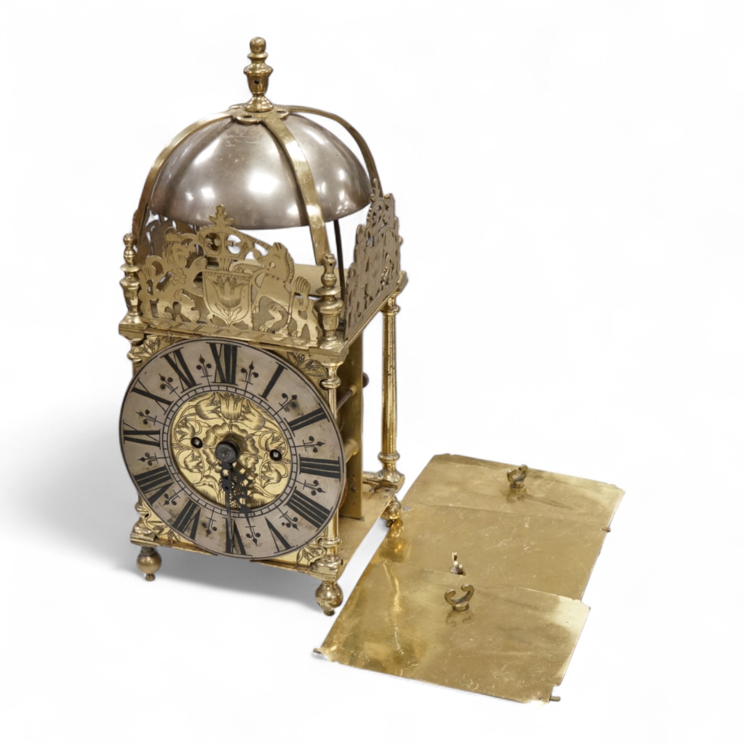 A twin fusee brass lantern clock, 38cm high.